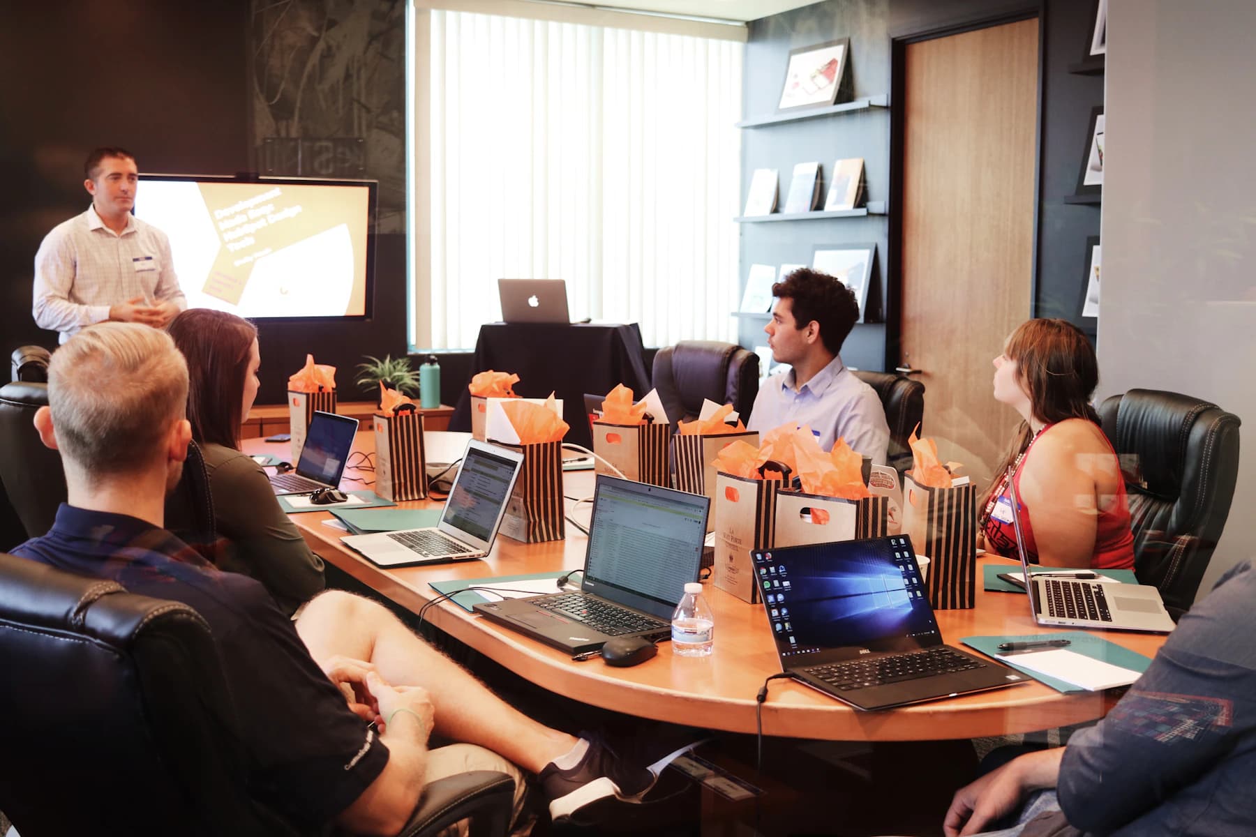 Employees taking part in a facilitated workplace learning session
